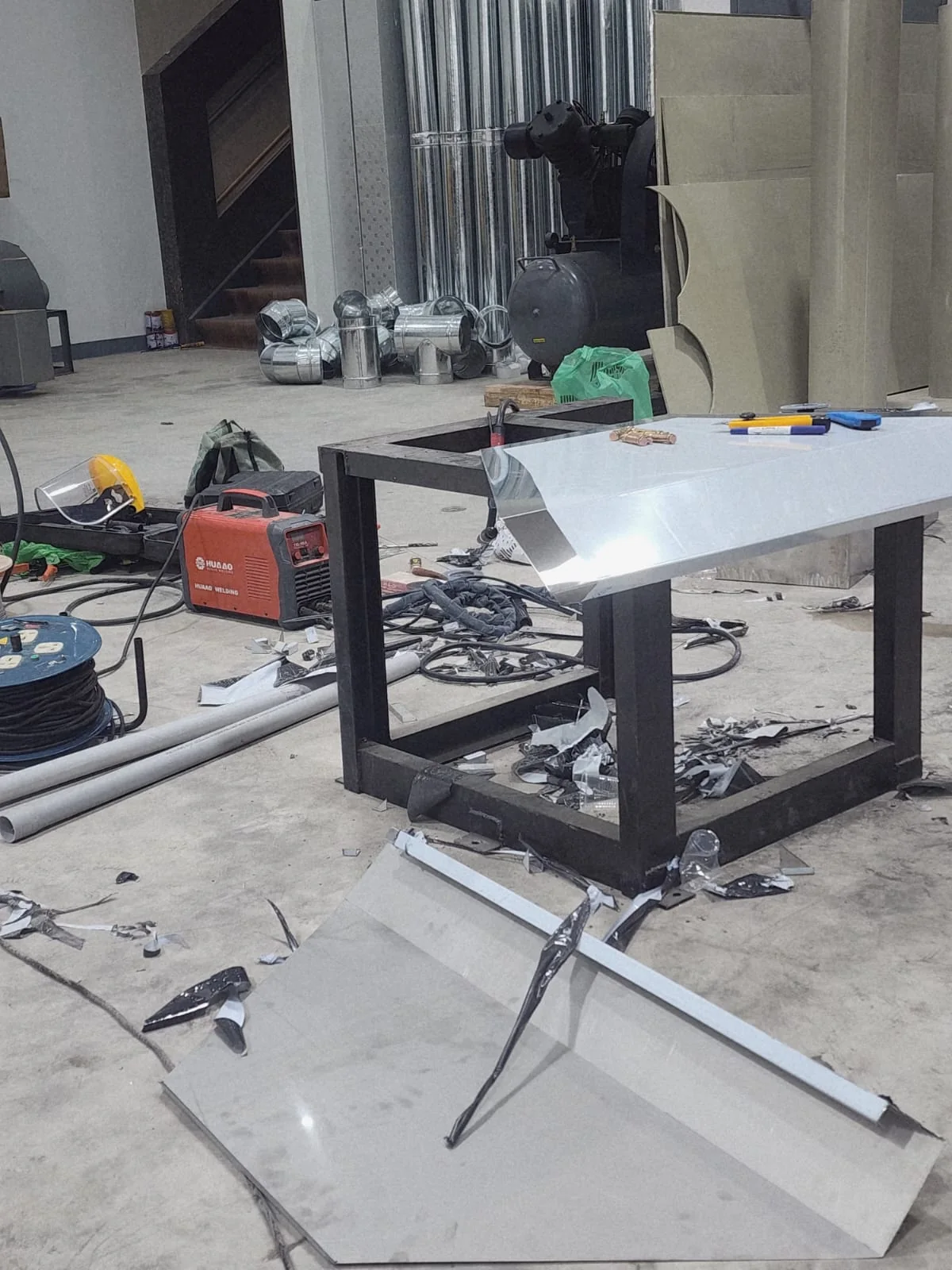 Commercial kitchen hood and duct assembly frame during fabrication