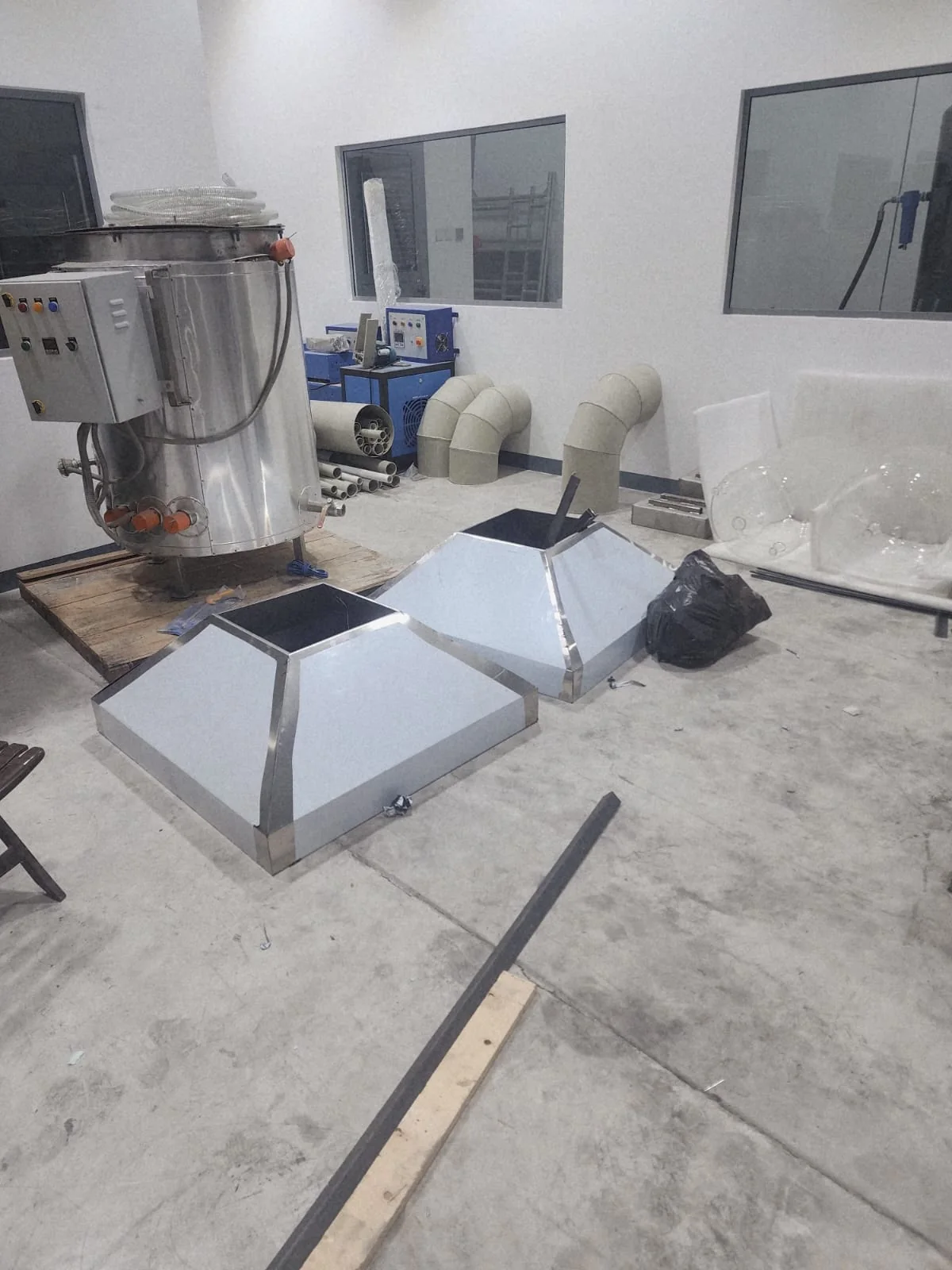 Commercial kitchen exhaust components prepared during BMS fabrication work