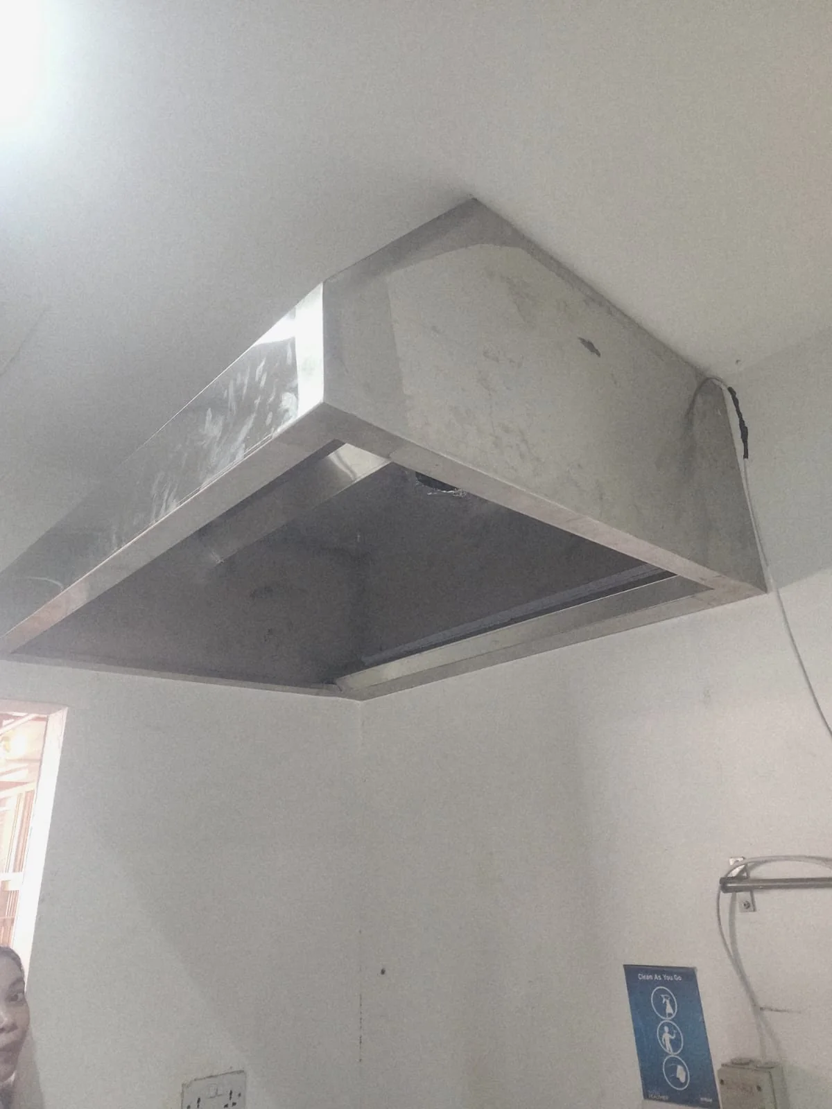 Installed stainless commercial kitchen extraction hood