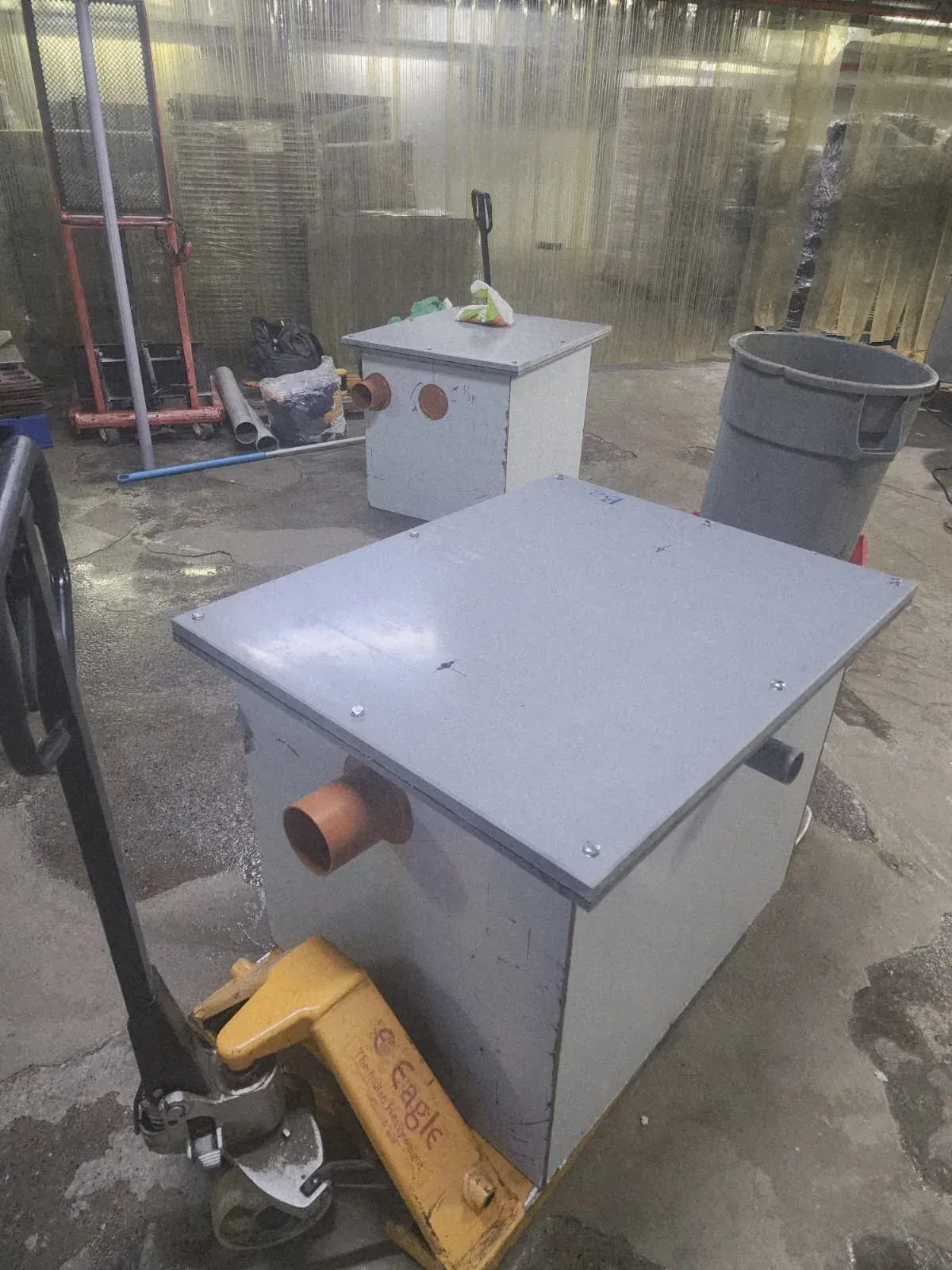 Installed Type B PVC grease trap with internal baffles for a commercial bakery in Dubai Investment Park